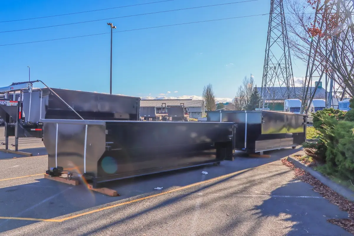 Roll-off dumpster ready for waste disposal at job site for Demolition Dumpster Rental in Elbridge